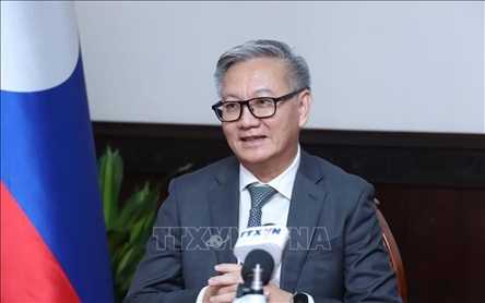 Lao FM praises eight decades of development in Vietnam